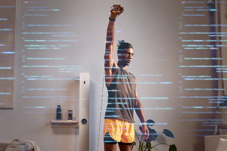 A man using the amp fitness machine, with AI code scribbled artistically across the image.