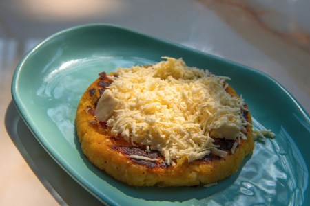 A delicious arepa with plenty of cheese