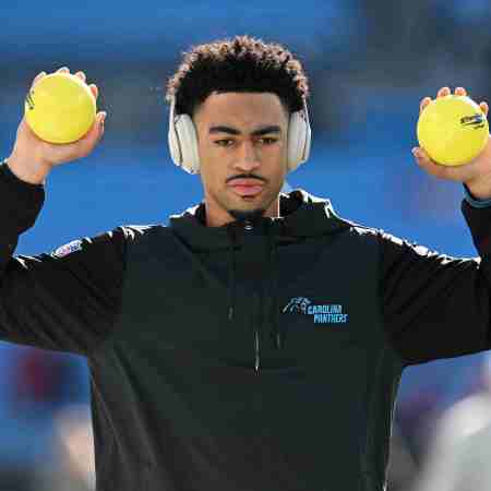 Bryce Young of the Panthers warms up.