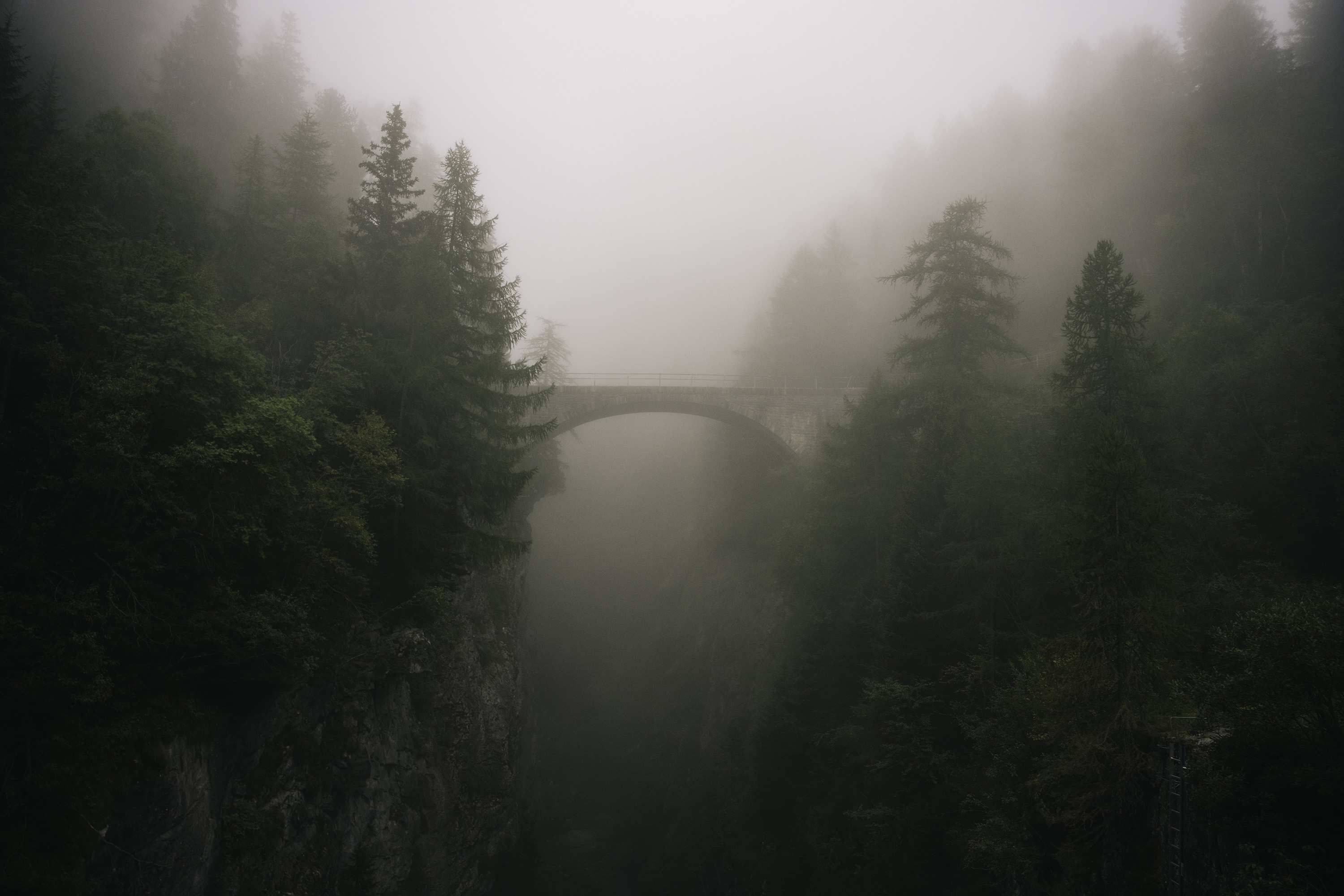 A view of the Mauvoisin Dam, shrouded in fog.