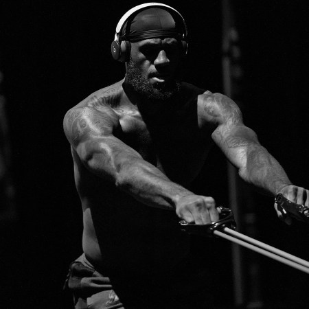 A photo of LeBron James exercising, in black and white.