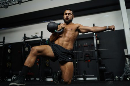 Eric Leija practices with a kettlebell.