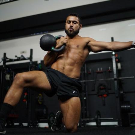 Eric Leija practices with a kettlebell.