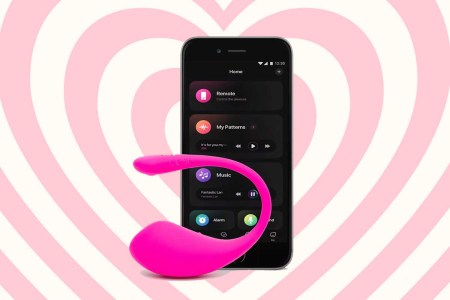 Lovense vibrator on a heart-shaped background