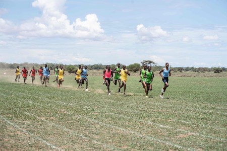 Maasai warriors running across the grasslands of East Africa. We visited them at Chem Chem Safari Lodge in Tanzania.