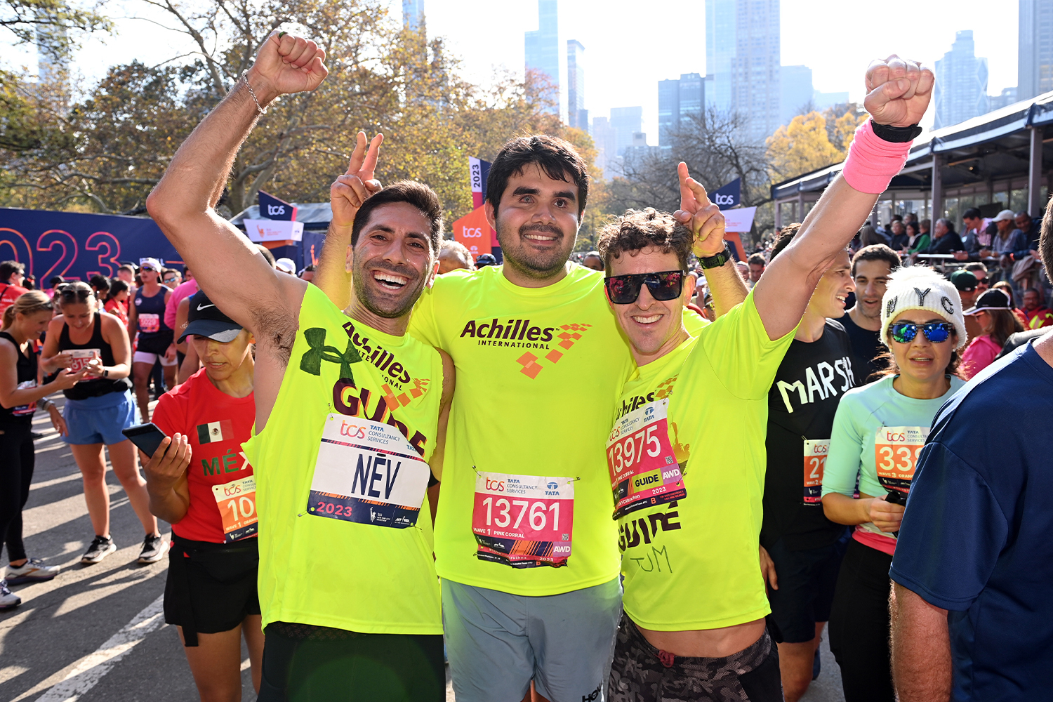 Nev Schulman pictured with Francesco Magisano, celebrating after the marathon in 2023.