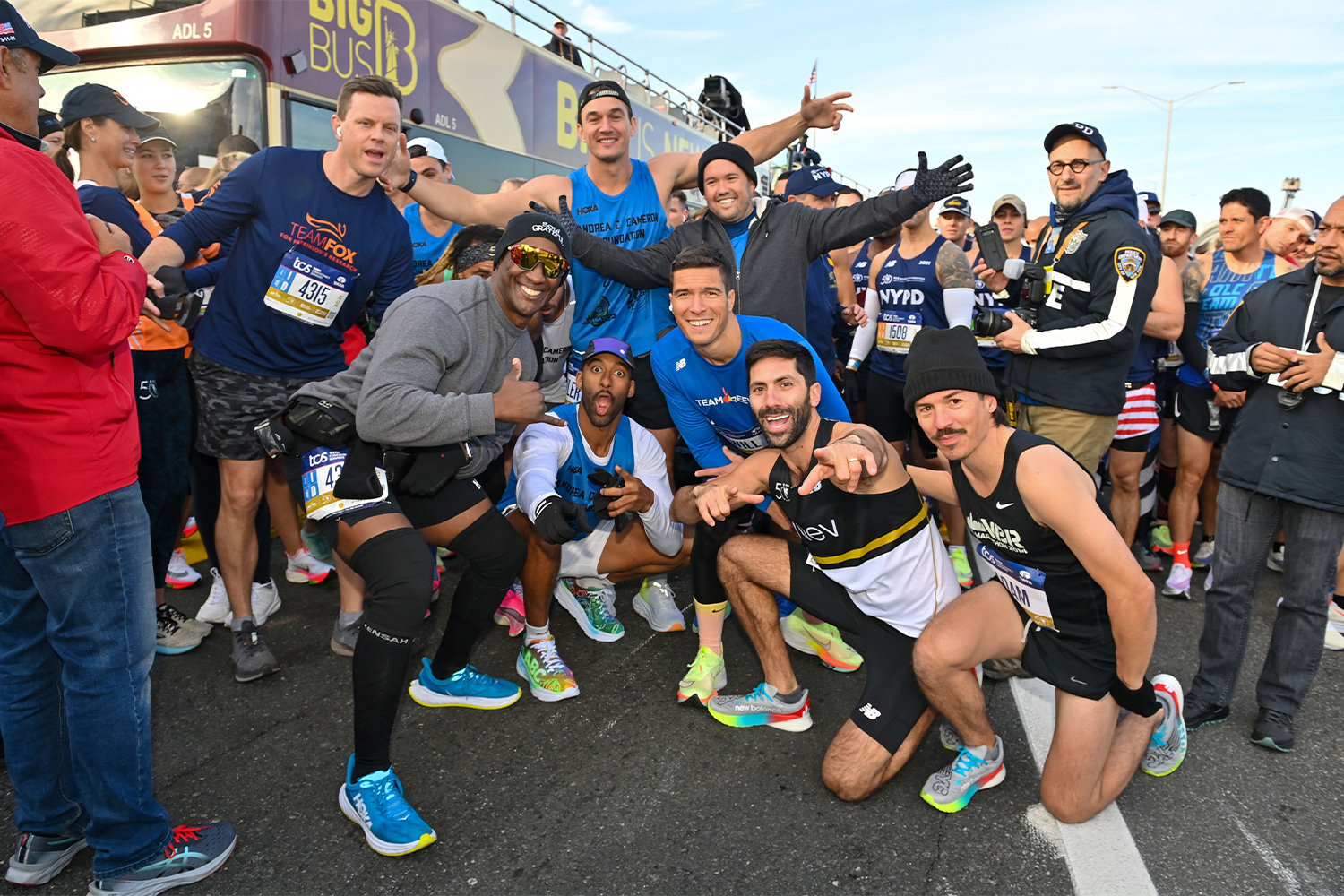 Nev Schulman posing with fellow celebrity marathoners in 2021.