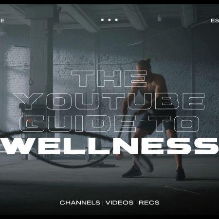 A man working out with battle ropes in an empty gym. We're taking a look at the best YouTube channels for fitness and wellness.